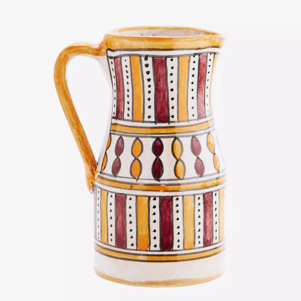 Orange and red stoneware jug